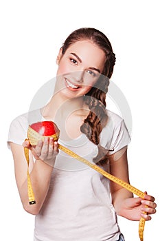 Healthy happy woman with apple and tape measure