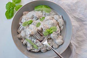 Healthy home made gnocchi with mushrooms and basil