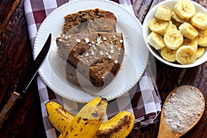 Healthy homemade banana cake made with oatmeal on rustic wooden table. sugar-free, milk-free, gluten-free