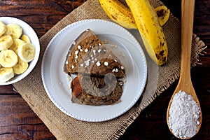 Healthy homemade banana cake made with oatmeal on rustic wooden table. sugar-free, milk-free, gluten-free