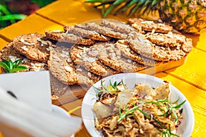 Healthy homemade biscuits from oat flakes laid on orange table