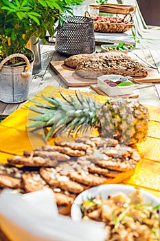 Healthy homemade biscuits from oat flakes laid on orange table