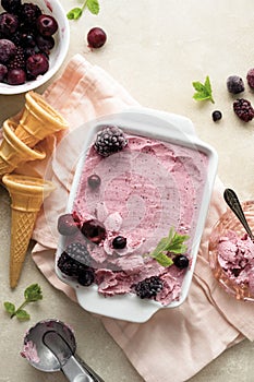 Healthy homemade raw vegan banana and berry ice cream with frozen berries fruits