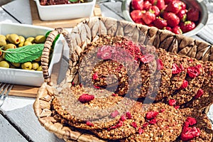 Healthy homemade strawberries biscuits from oat flakes laid