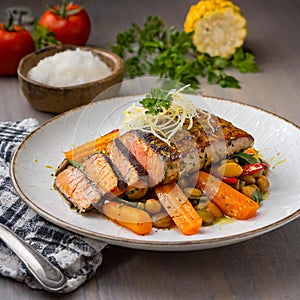 Healthy ifestyle. Concept of tasty and balanced diet. Delicious salmon dish with vegetables