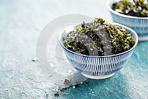 Healthy Japanese bowl of seaweed with sesame and sea salt.