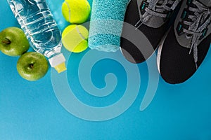 Healthy Life Sport Concept. Sneakers with Tennis Balls, Towel an