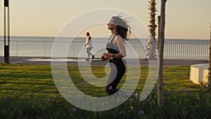 healthy lifestyle beautiful asian woman running at sunrise seaside.