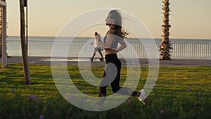 healthy lifestyle beautiful asian woman running at sunrise seaside.