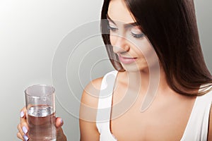 Healthy Lifestyle. Close-up Portrait Of Young Woman Drinking Ref