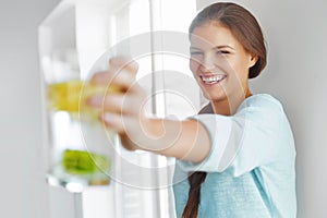 Healthy Lifestyle Concept, Diet And Fitness. Woman Drinking Water With Lemon , Lime And Mint