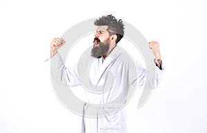 Healthy lifestyle concept. Energetic man in the morning. Young guy side view over white background