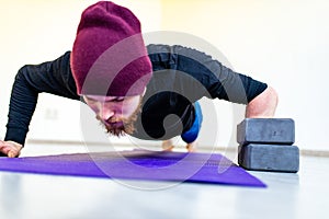 healthy lifestyle concept - man making exercises at home