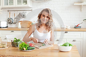 Healthy lifestyle concept. Yound beautiful woman with mixed vegetable salad