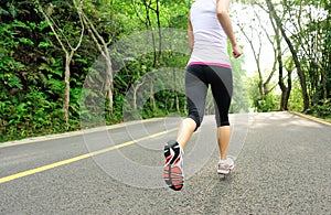 Healthy lifestyle fitness sports woman running leg