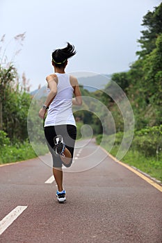 Healthy lifestyle fitness sports woman running leg
