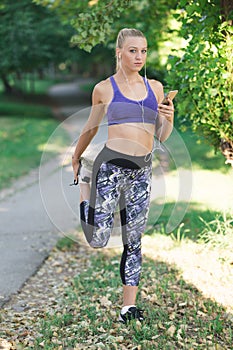 Healthy lifestyle fitness sporty woman running early in the morning in park