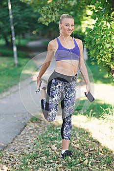 Healthy lifestyle fitness sporty woman running early in the morning in park