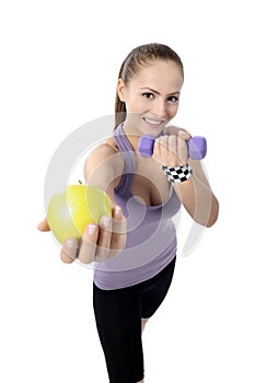 Healthy lifestyle - fitness woman eating apple