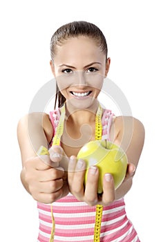 Healthy lifestyle - fitness woman hand apple