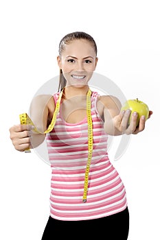 Healthy lifestyle - fitness woman hand apple