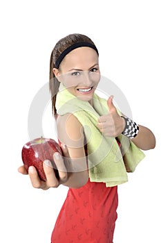 Healthy lifestyle - fitness woman hand apple