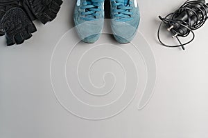 Healthy lifestyle. Jump rope  equipment on a grey background. Top view with copy space