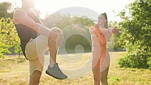 Healthy Lifestyle Man and Woman Doing Physical Exercise