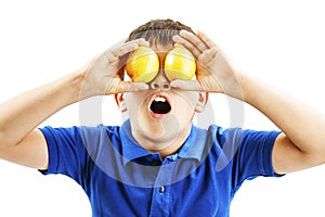 Healthy lifestyle people. Funny image of little boy showing lemons