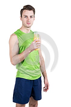 Healthy lifestyle. Portrait of a handsome guy with juice, wearing sportswear, isolated on white background, looking at camera. Ver