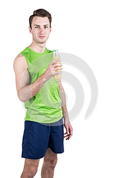 Healthy lifestyle. Portrait of a handsome guy with juice, wearing sportswear, isolated on white background, looking at camera. Ver