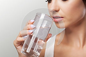 Healthy Lifestyle. Portrait Of Happy Smiling Young Woman With Glass Of Fresh Water. Healthcare. Drinks. Health, Beauty, Diet