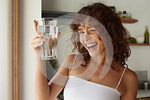 Healthy Lifestyle. Portrait Of Happy Smiling Young Woman With Glass Of Fresh Water