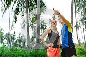 Healthy Lifestyle. Runner Couple Preparing To Jog. Fitness And S