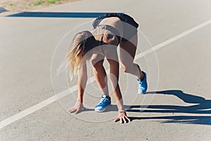 Healthy lifestyle sports woman running on asphalt driveway.