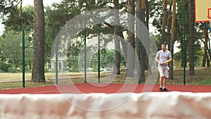 Healthy lifestyle sporty man playing tennis outdoor
