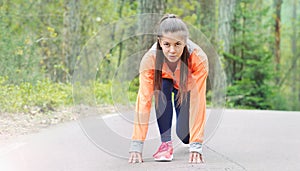 Healthy lifestyle sporty woman begining run early in the morning
