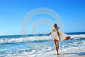 Healthy Lifestyle. Surfing. Water Sports. Woman With Surfboard.