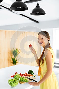 Healthy Lifestyle. Woman Cutting Organic Vegetables. Food Preparation. Diet. Nutrition.