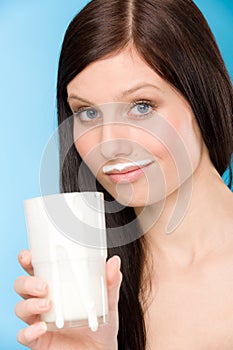 Healthy lifestyle - woman drink milk breakfast