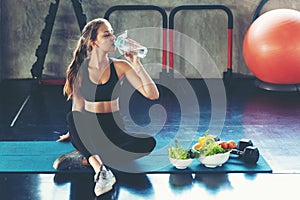 Healthy lifestyle woman drink water at fitness gym. Young people girl workout exercise body for diet and slim health.