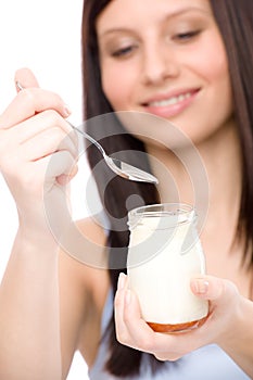 Healthy lifestyle - woman eat yogurt