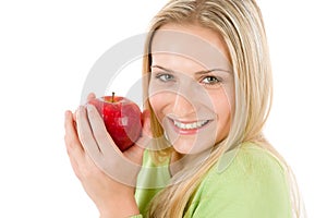 Healthy lifestyle - woman holding red apple