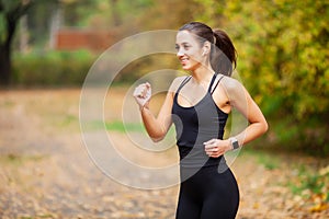 Healthy lifestyle. Woman jogging on forest trail