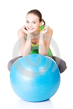 Healthy lifestyle woman with pilates exercise ball.