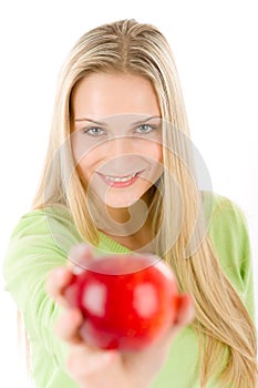 Healthy lifestyle - woman with red apple