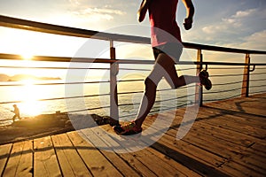 Healthy lifestyle woman runner running seaside