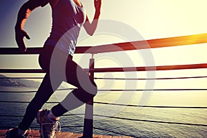 Healthy lifestyle woman running seaside