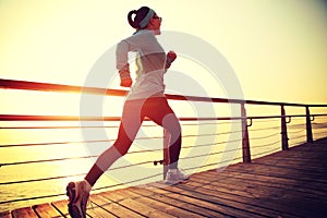 Healthy lifestyle woman running seaside