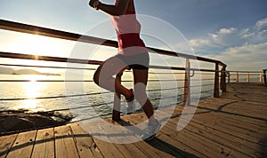 Healthy lifestyle woman running seaside